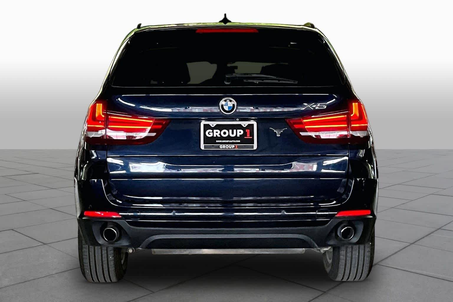 Used 2015 Imperial Blue Metallic BMW sDrive35i image 4