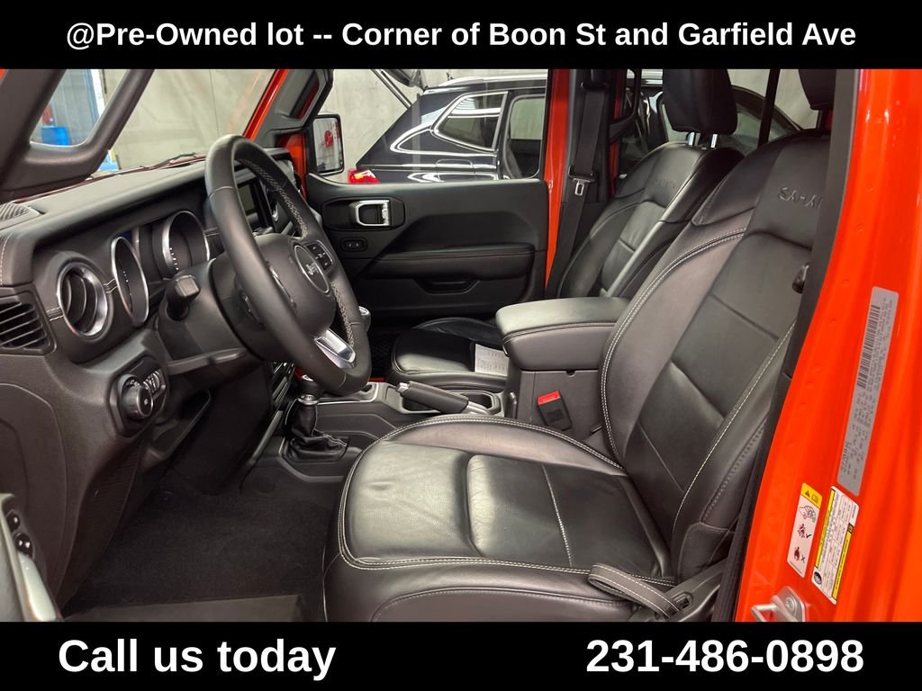 Used 2018 Orange Jeep Unlimited Sahara image 14
