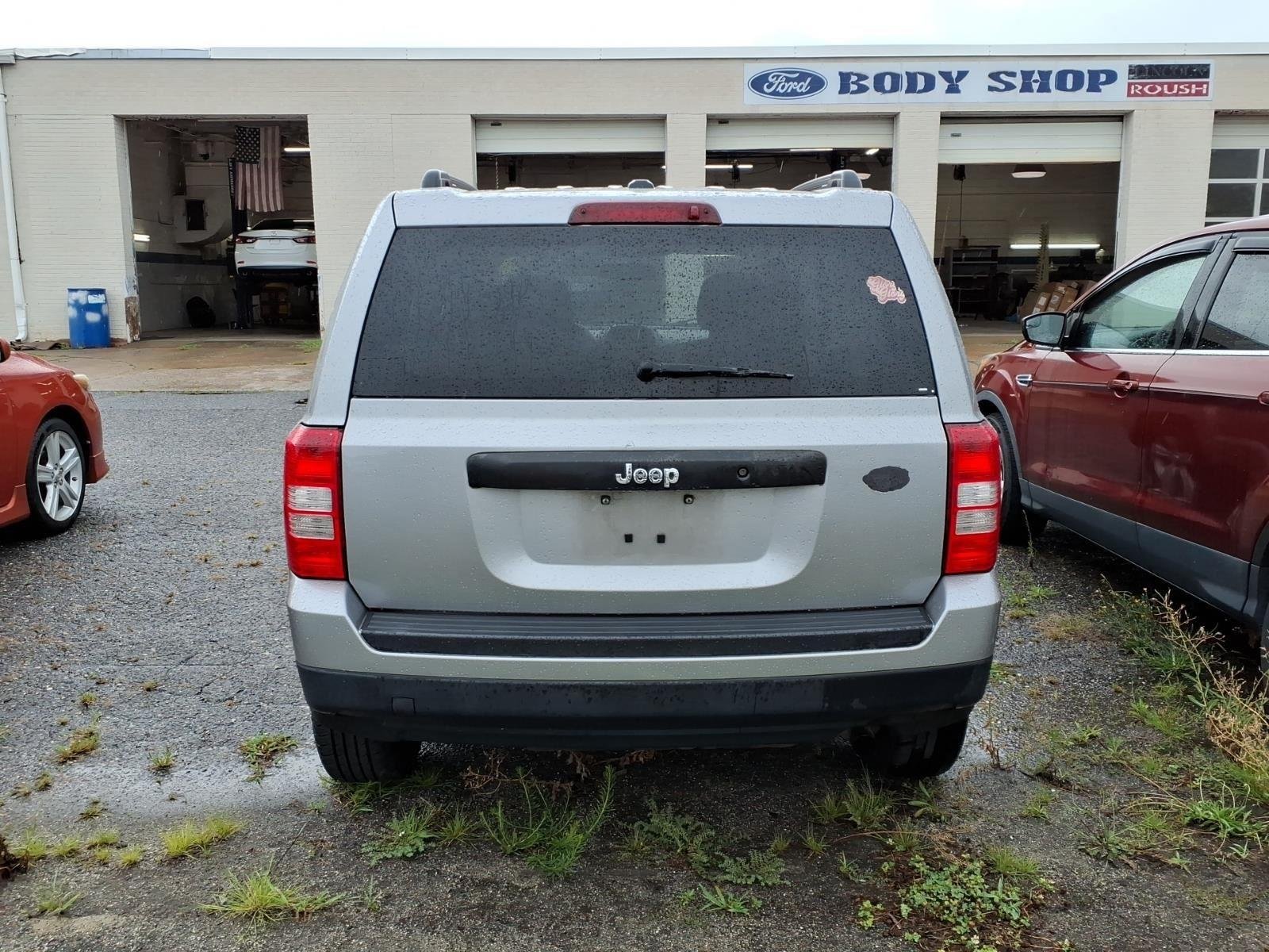 Used 2016 Deep Cherry Red Crystal Pearlcoat Jeep Sport image 5