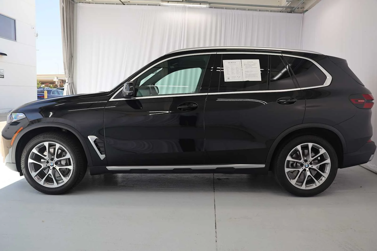 Certified Used 2026 Black Sapphire Metallic BMW xDrive40i image 7