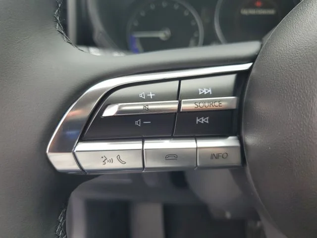 New 2026 Machine Gray Metallic Mazda Premium AWD image 4
