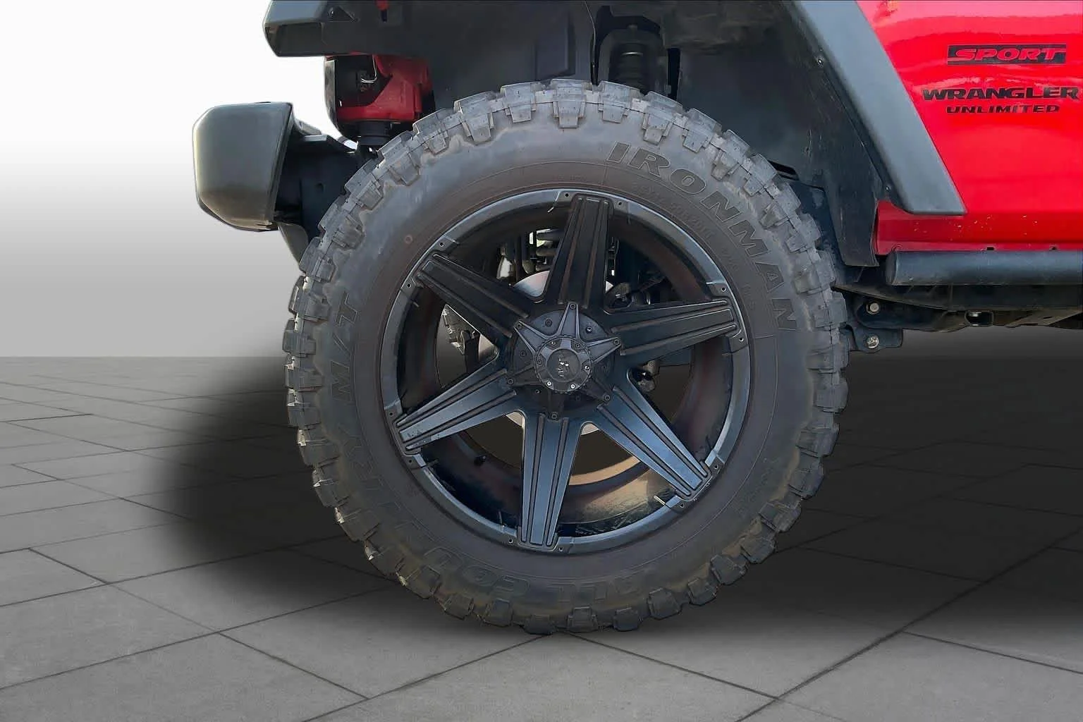 Used 2015 Firecracker Red Clear Coat Jeep Sport image 10