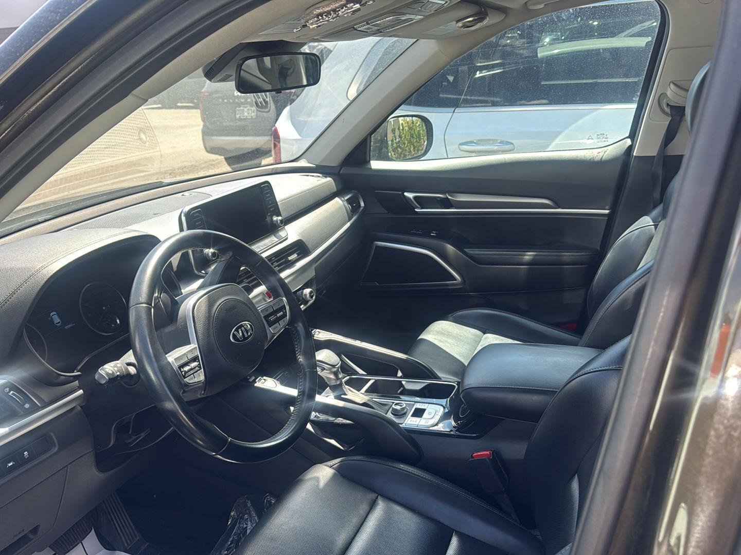 Used 2020 Dark Moss Kia S image 7