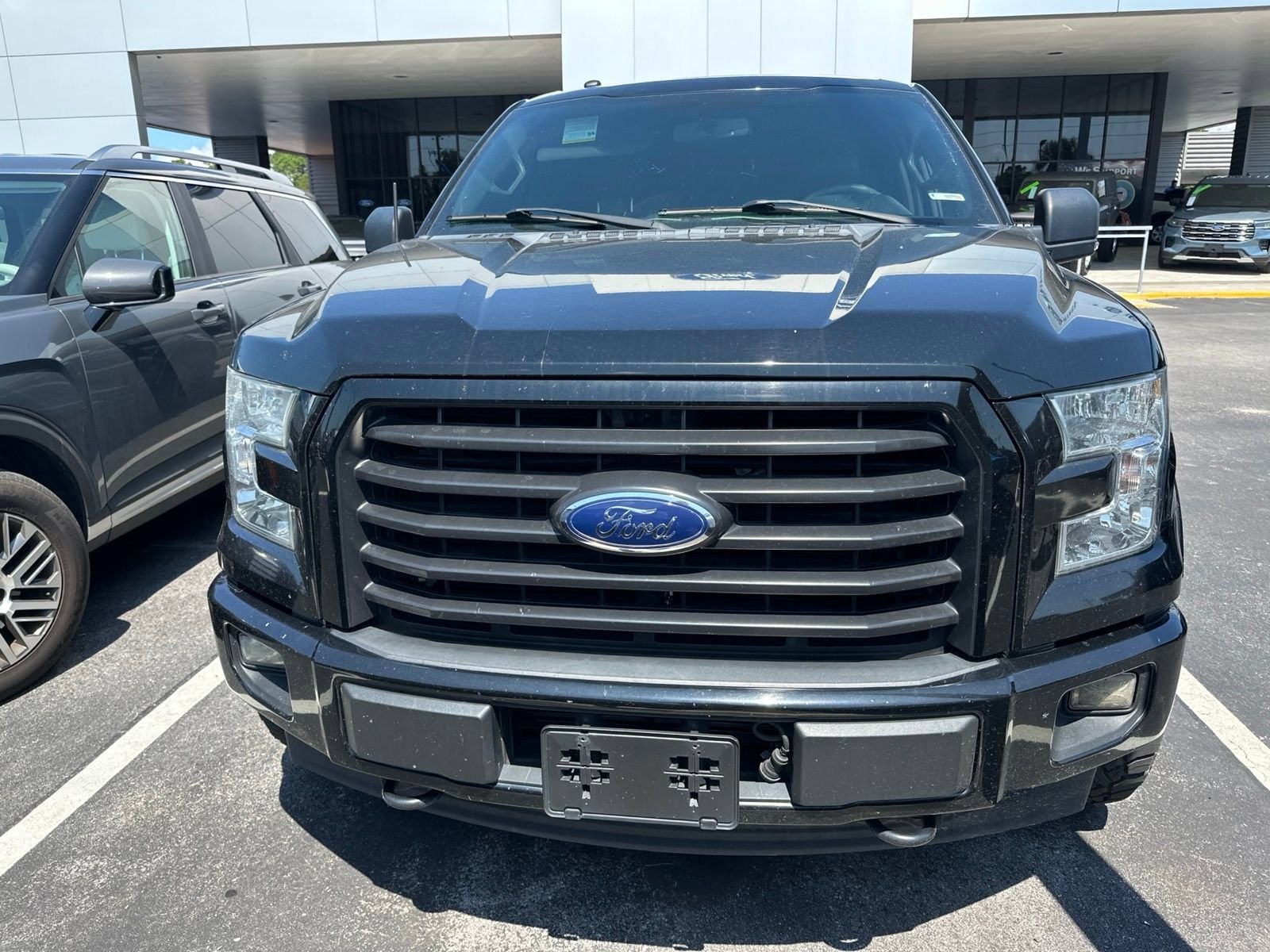 Used 2017 Ford F-150 XLT with VIN 1FTEW1EPXHFA49120 for sale in Spring Hill, FL