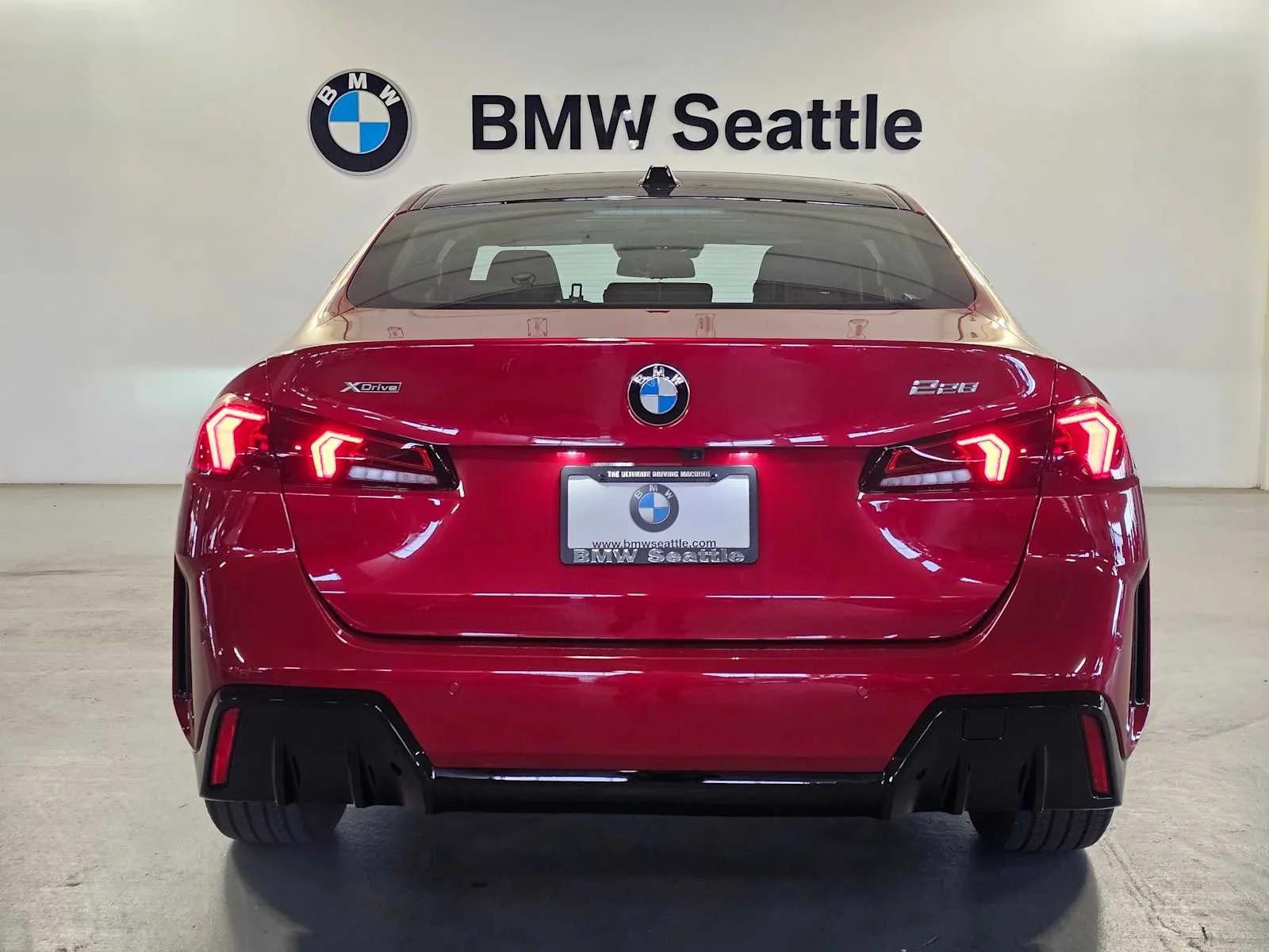 Certified Used 2025 Vegas Red Metallic BMW 228 xDrive image 4
