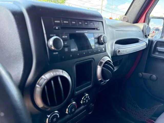 Used 2013 Deep Cherry Red Crystal Jeep Sport image 25
