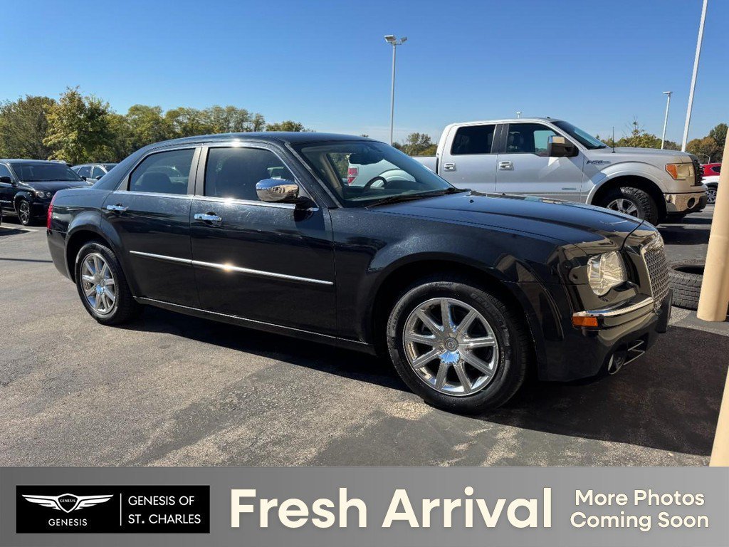 Used 2009 Brilliant Black Crystal Pearlcoat/Black Cloth Top Chrysler Limited image 1