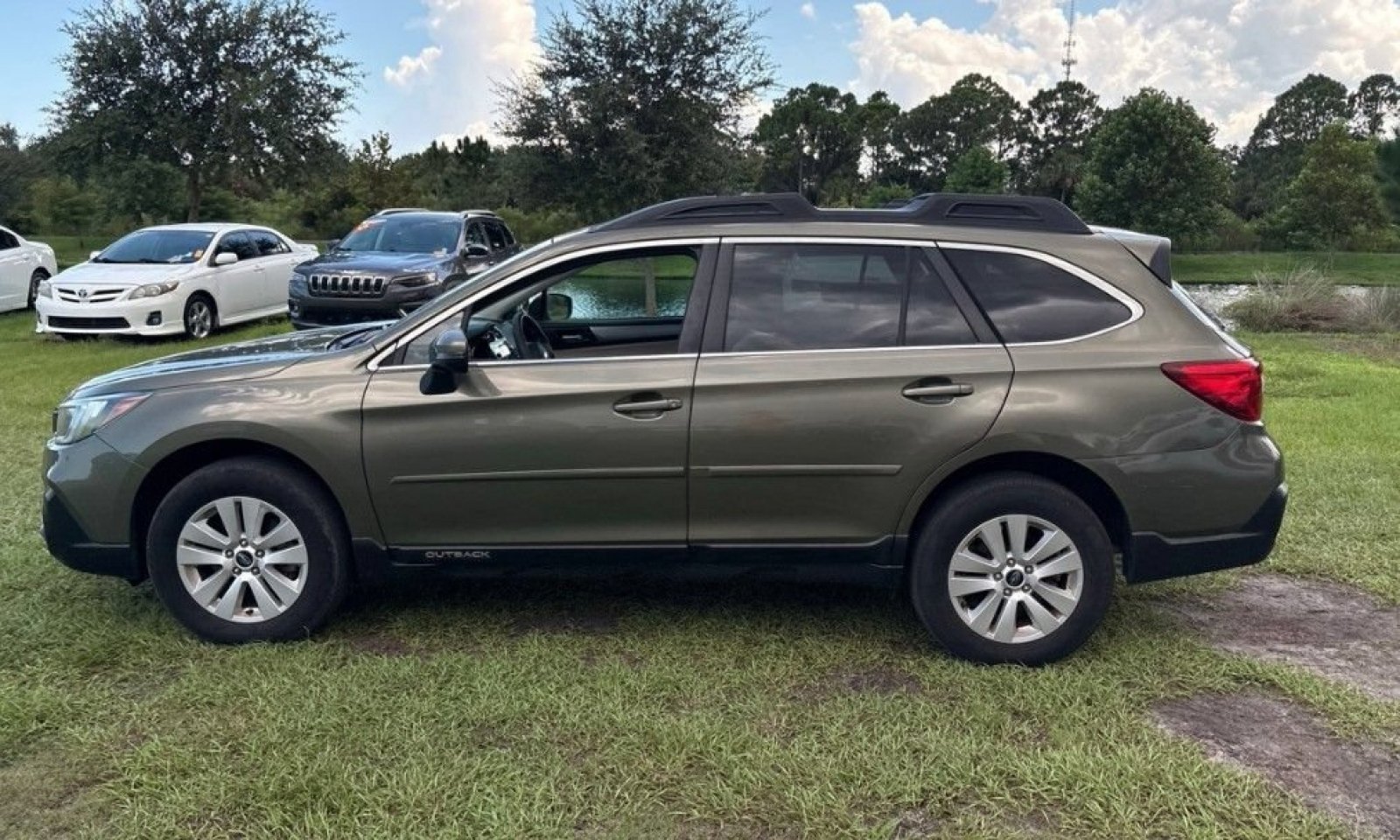 Used 2019 Wilderness Green Metallic Subaru Premium image 9
