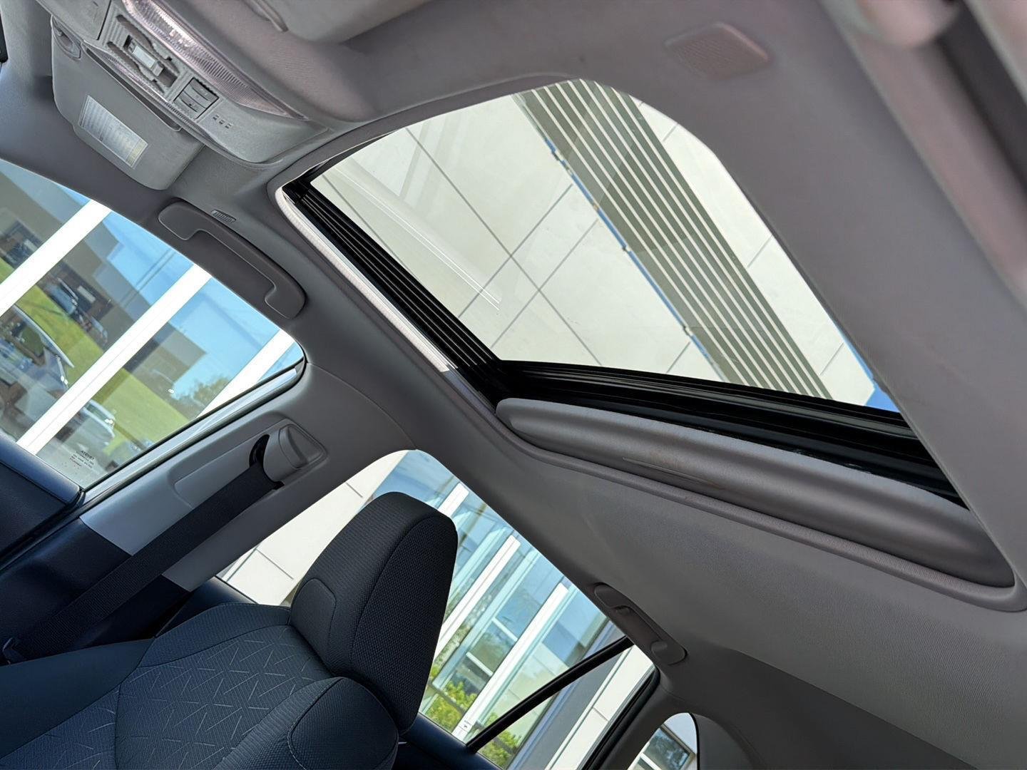 Used 2023 Silver Sky Metallic Toyota Hybrid XLE image 32