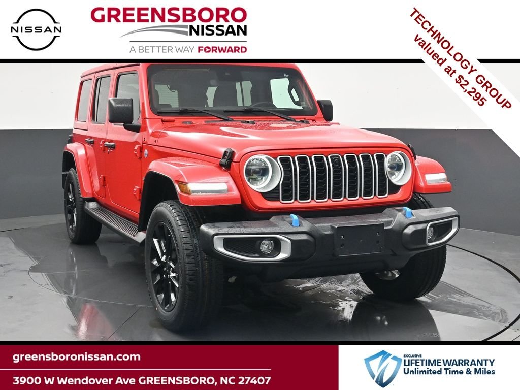 Used 2024 Red Jeep Sahara 4xe image 1