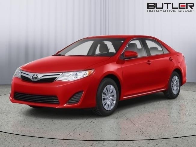Used 2012 Barcelona Red Metallic Toyota LE image 1