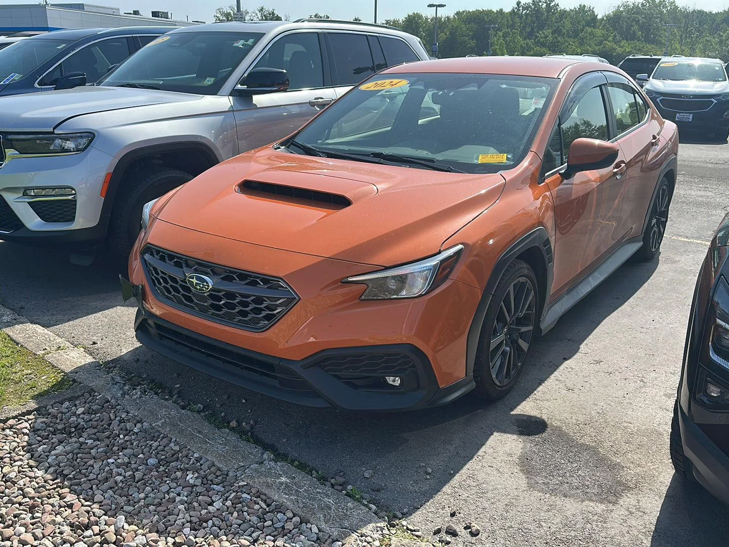 Used 2024 Solar Orange Pearl Subaru Premium image 5