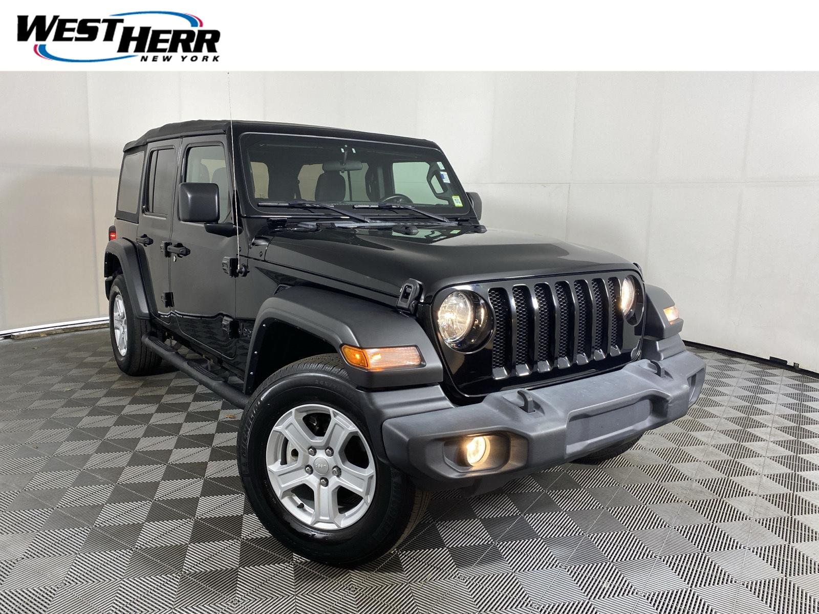 Used 2022 Black Clearcoat Jeep Unlimited Sport S image 1