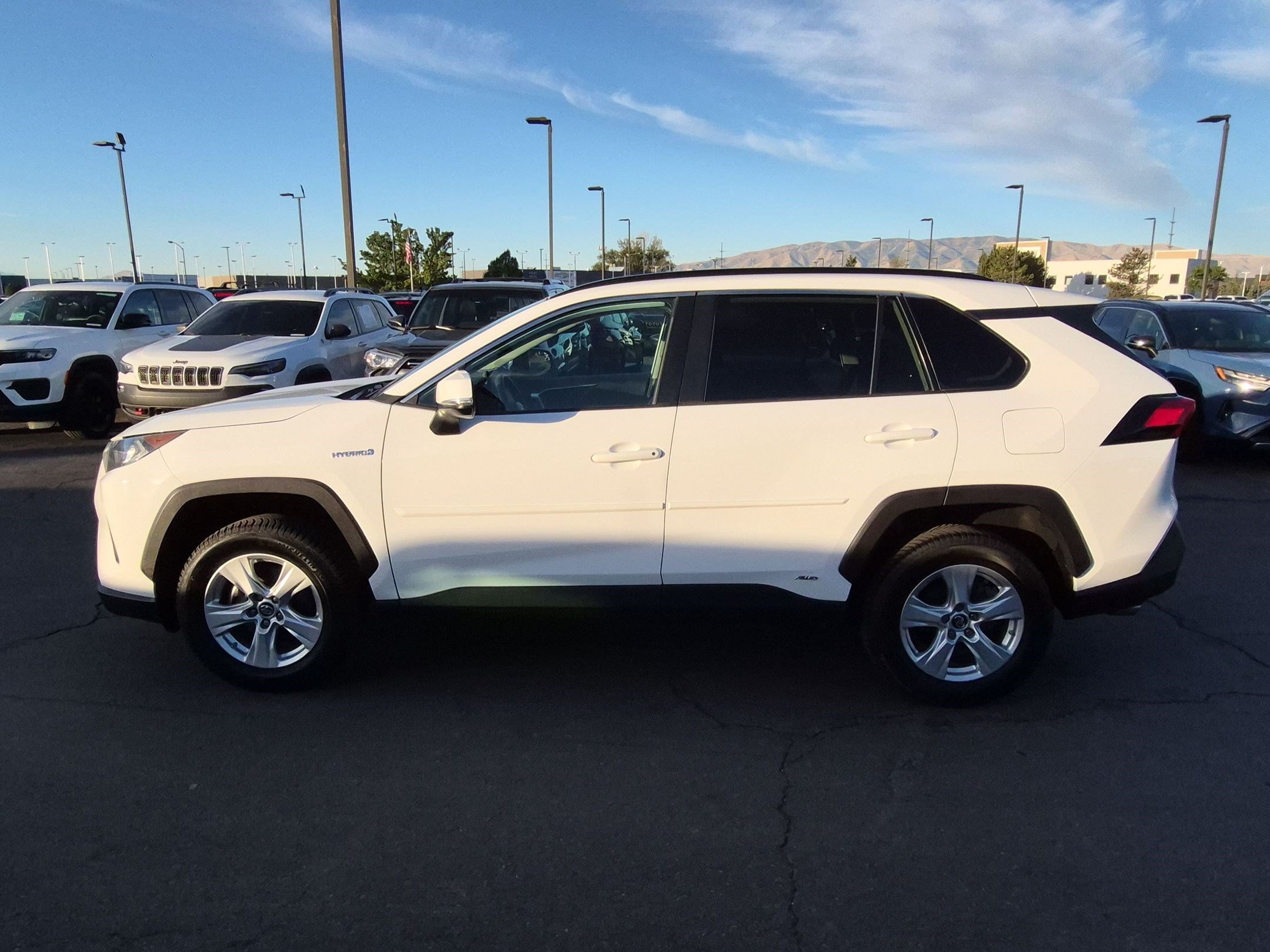 Used 2019 Super White Toyota Hybrid LE image 7