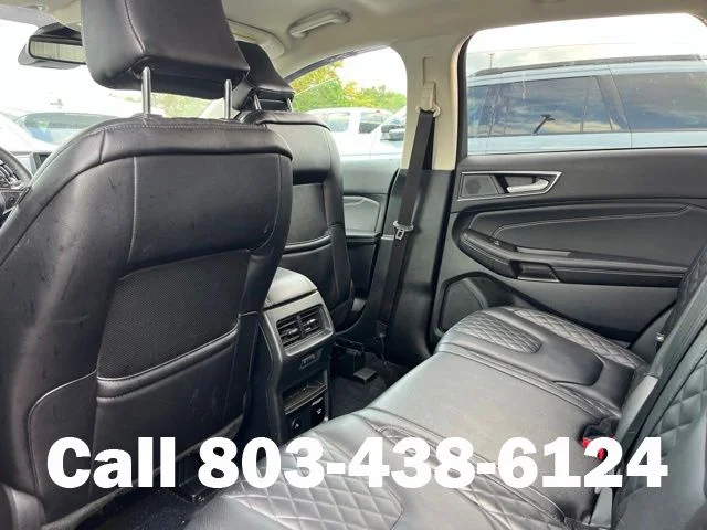 Used 2024 Rapid Red Metallic Tinted Clearcoat Ford Titanium image 9