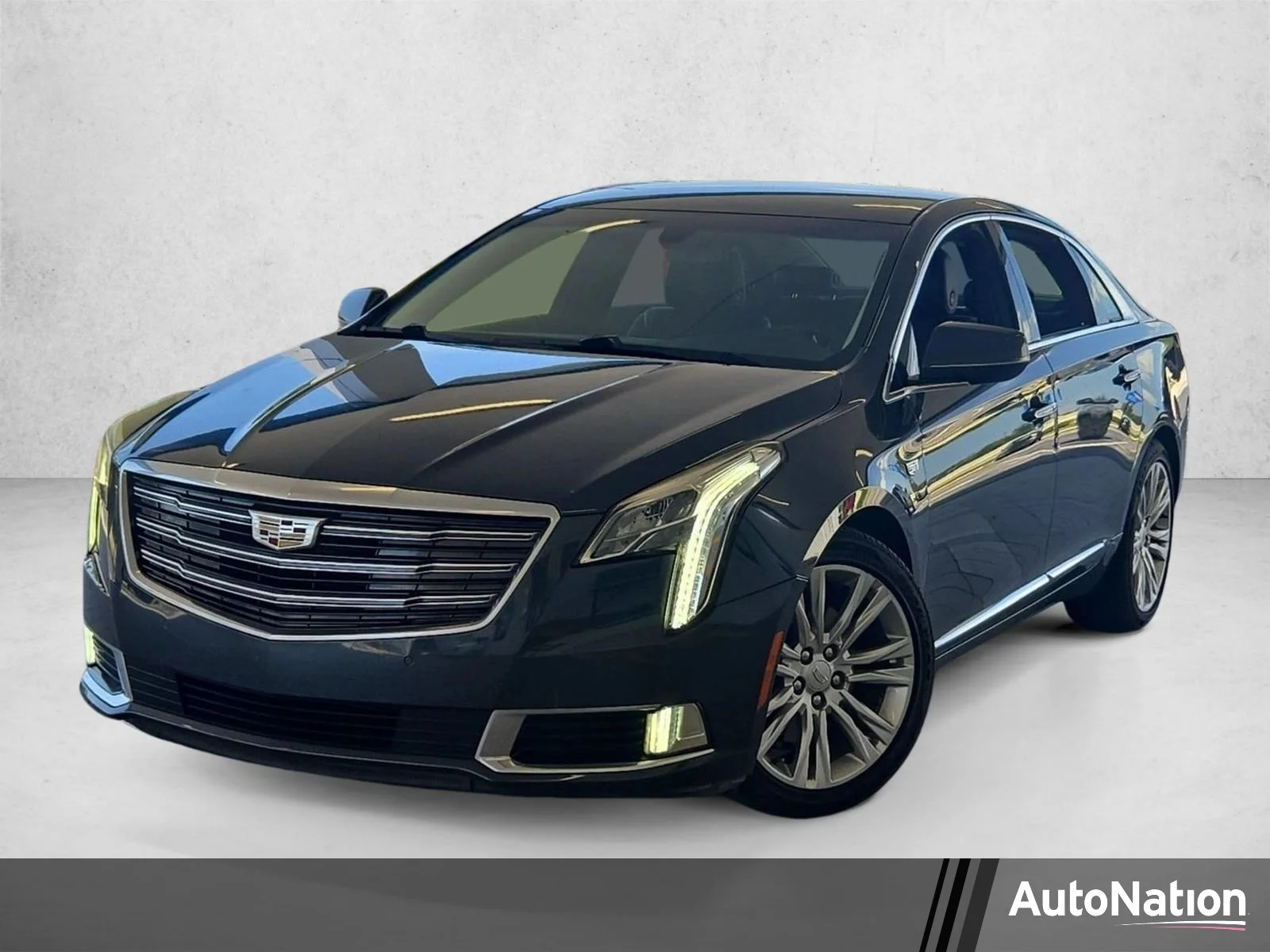 Used 2018 Stone Gray Metallic Cadillac Luxury image 1