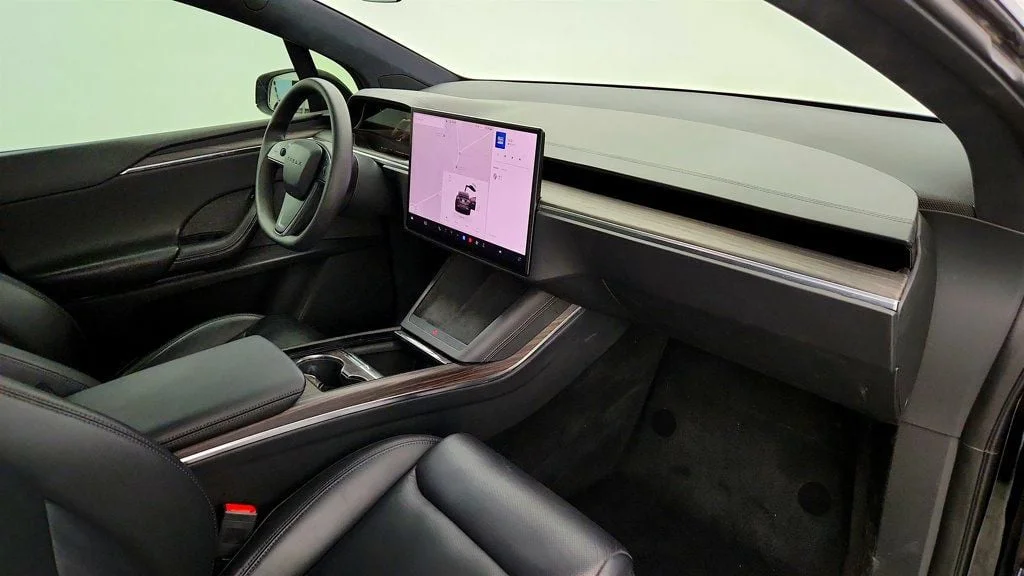 Used 2023 Solid Black Tesla AWD image 31