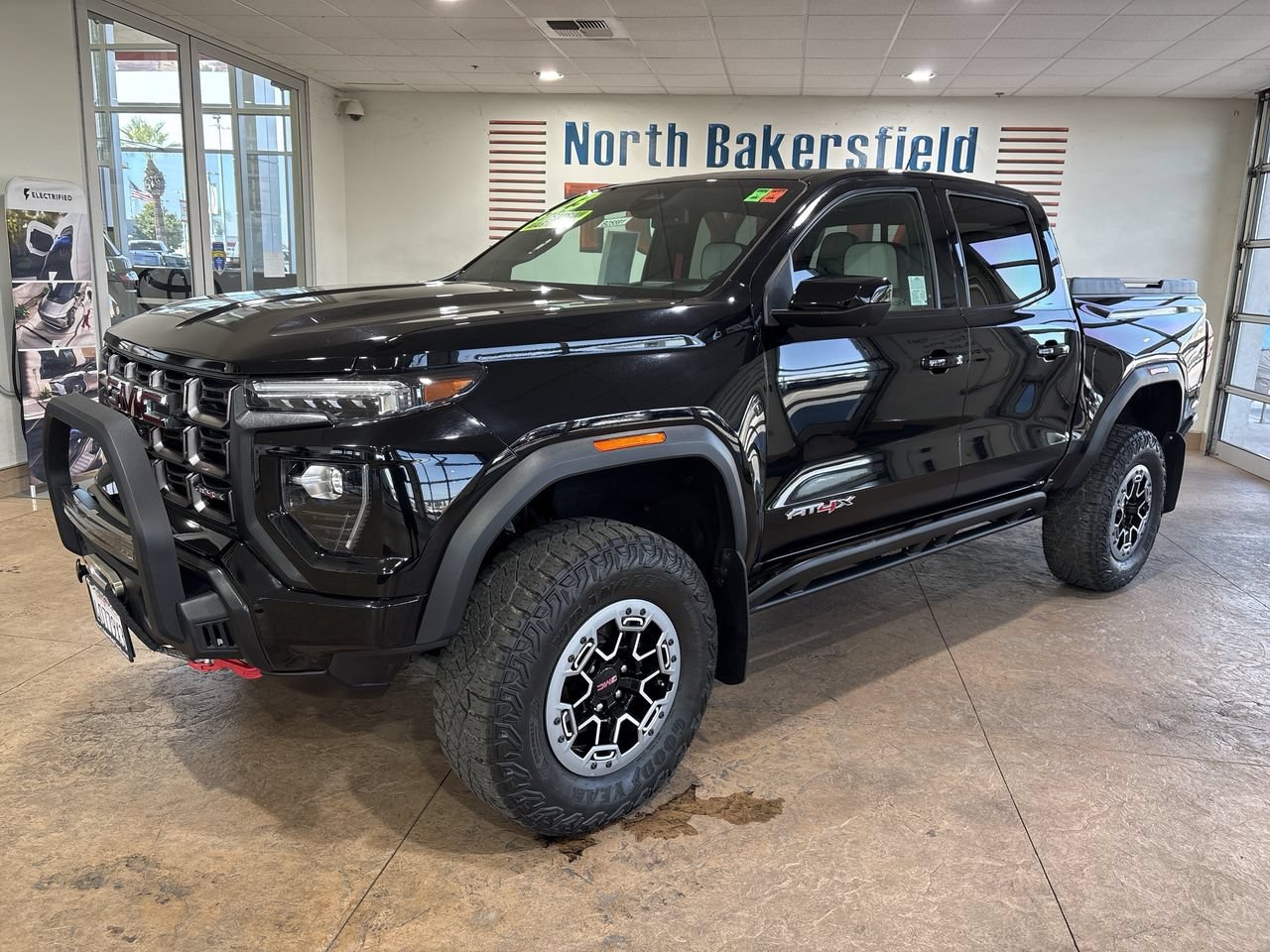 Used 2023 Onyx Black GMC 4WD AT4X image 1