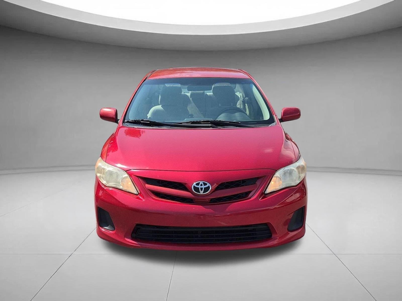 Used 2011 Barcelona Red Metallic Toyota LE image 8
