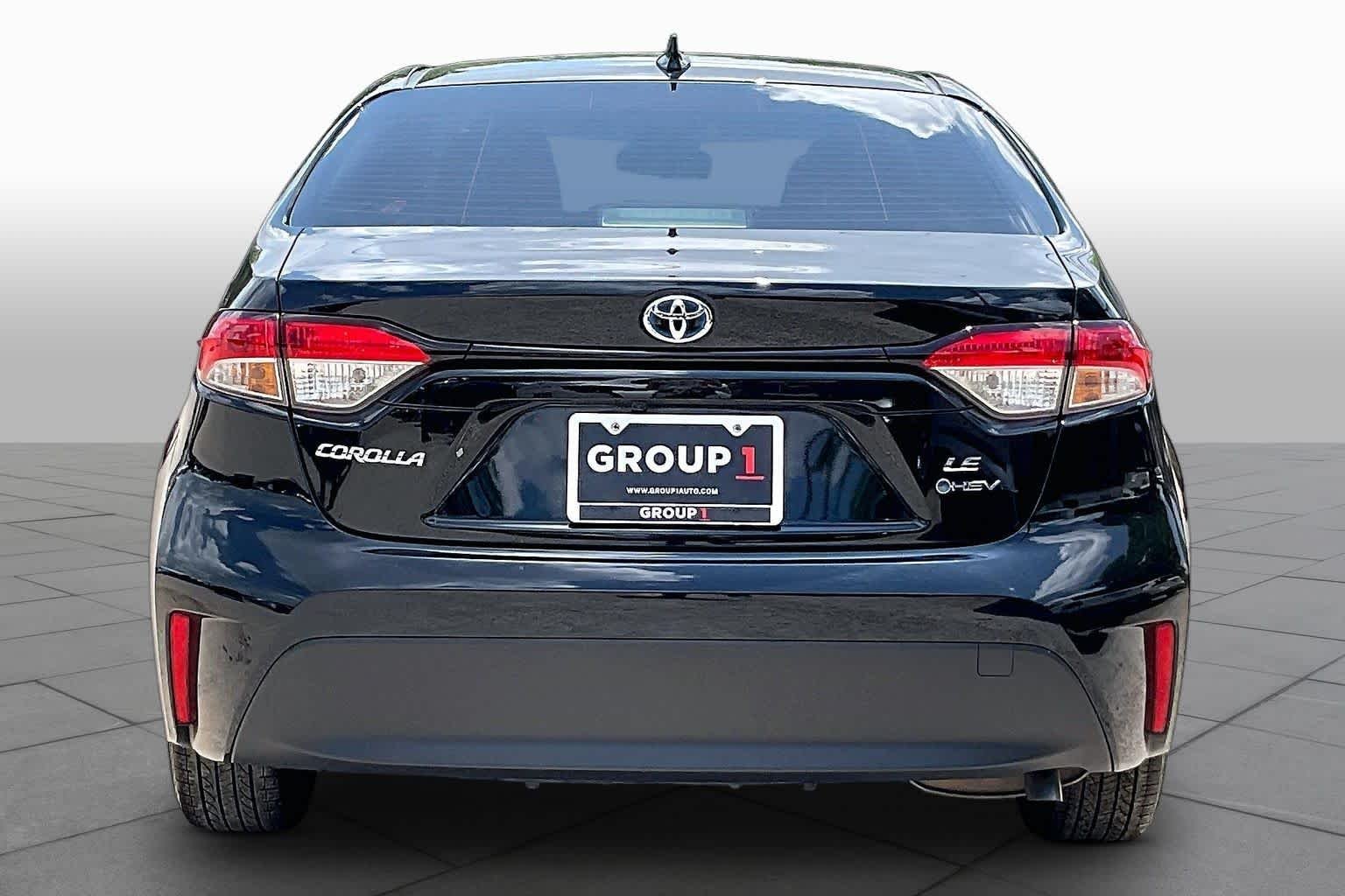 Used 2025 Midnight Black Metallic Toyota Hybrid LE image 5