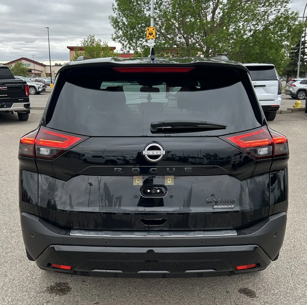 Used 2023 Black Nissan SV Moonroof image 4