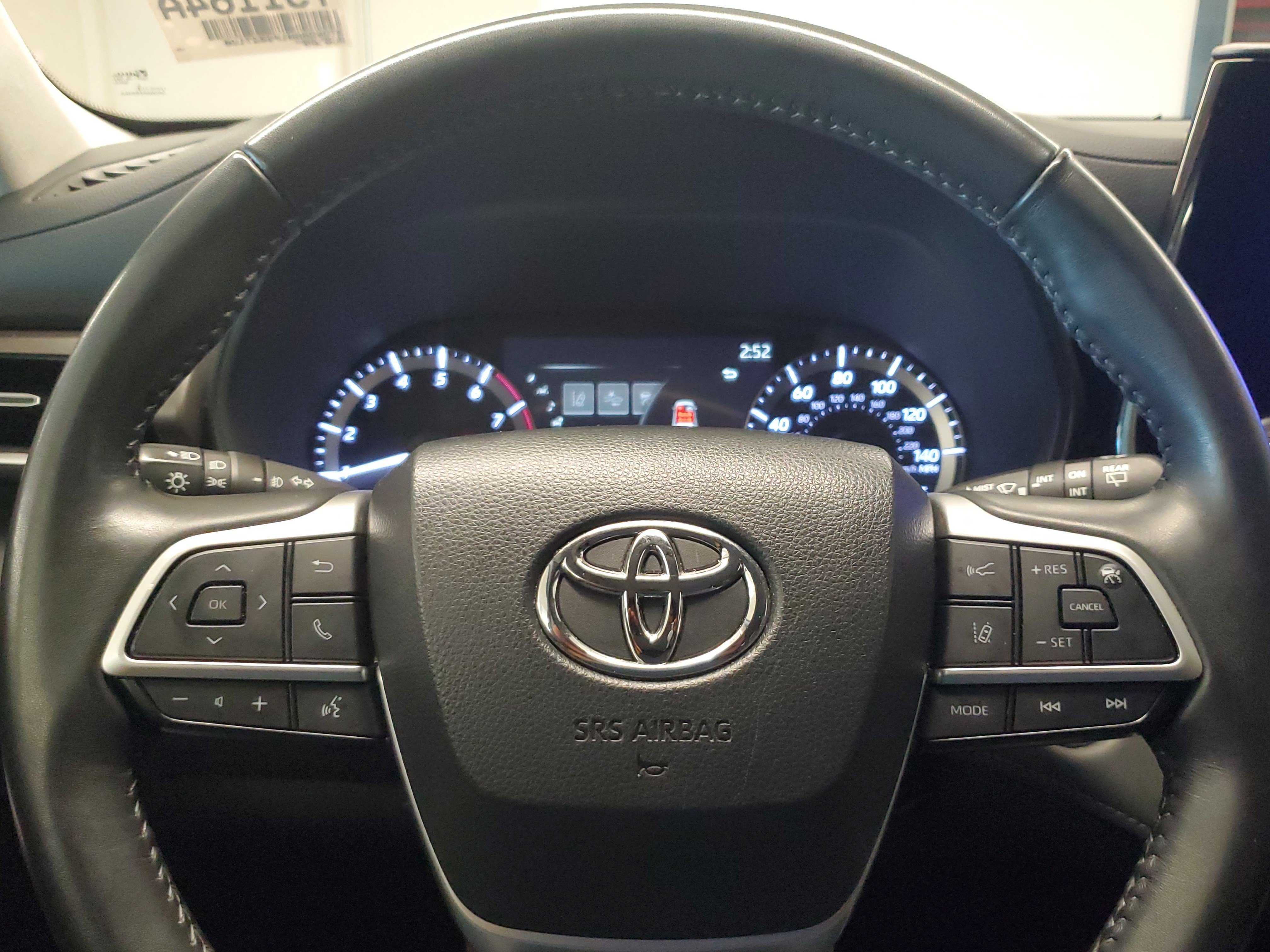 Used 2023 Celestial Silver Metallic Toyota LE image 24