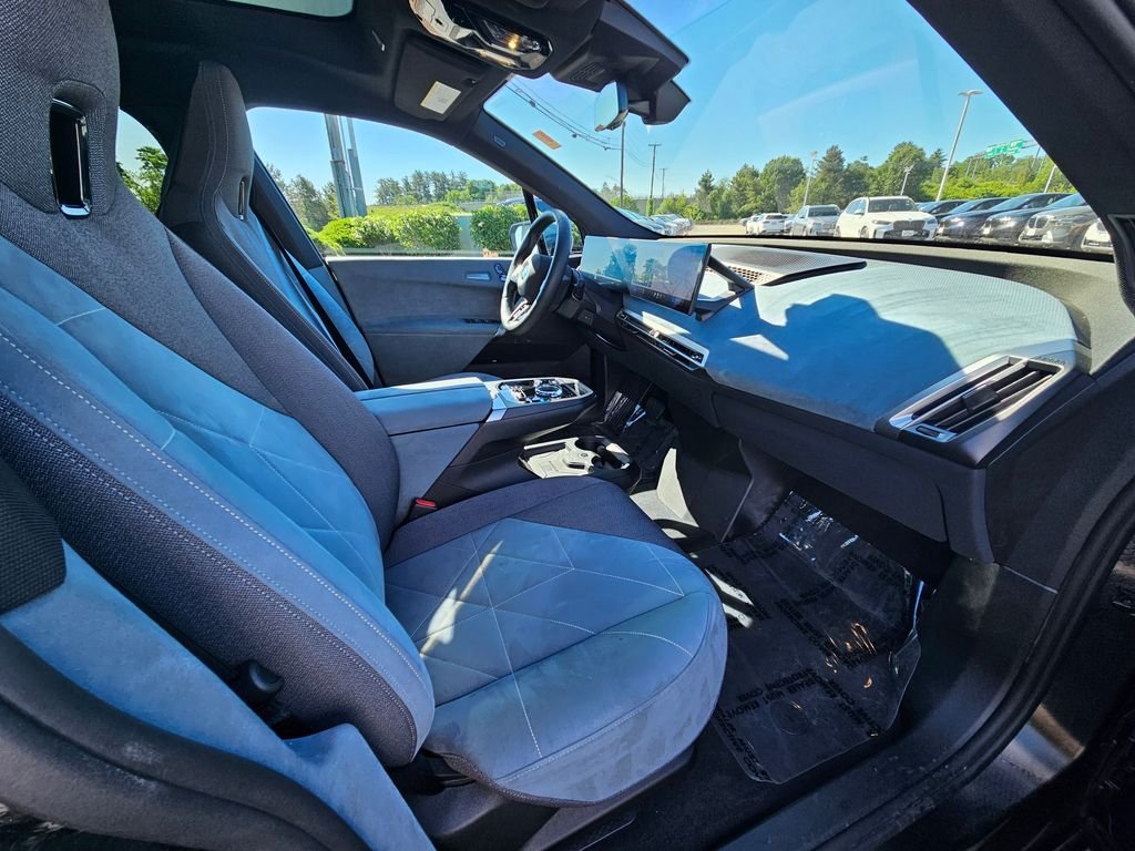 Certified Used 2025 Blue BMW xDrive50 image 14