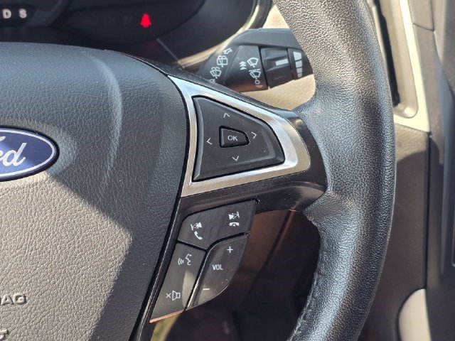 Used 2024 Agate Black Metallic Ford SEL image 24