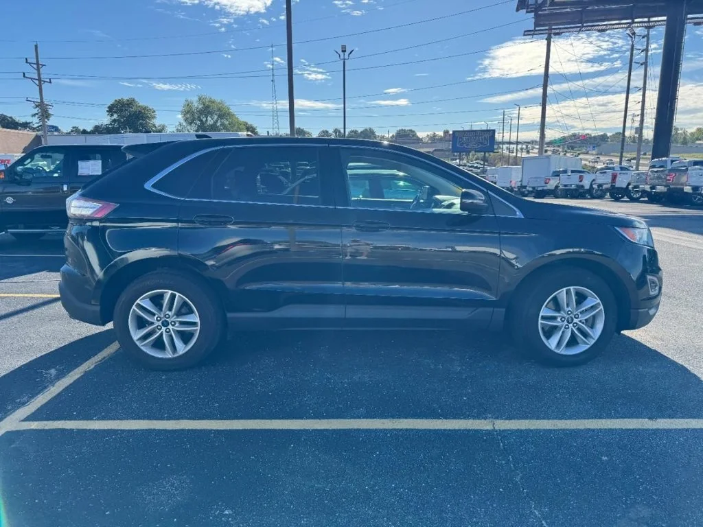 Used 2018 Shadow Black Ford SEL image 4