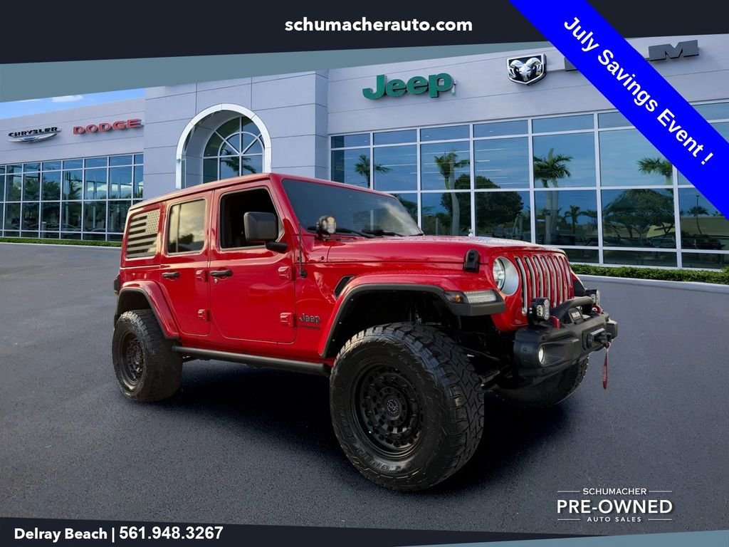 Used 2022 Red Jeep Unlimited Sahara image 1