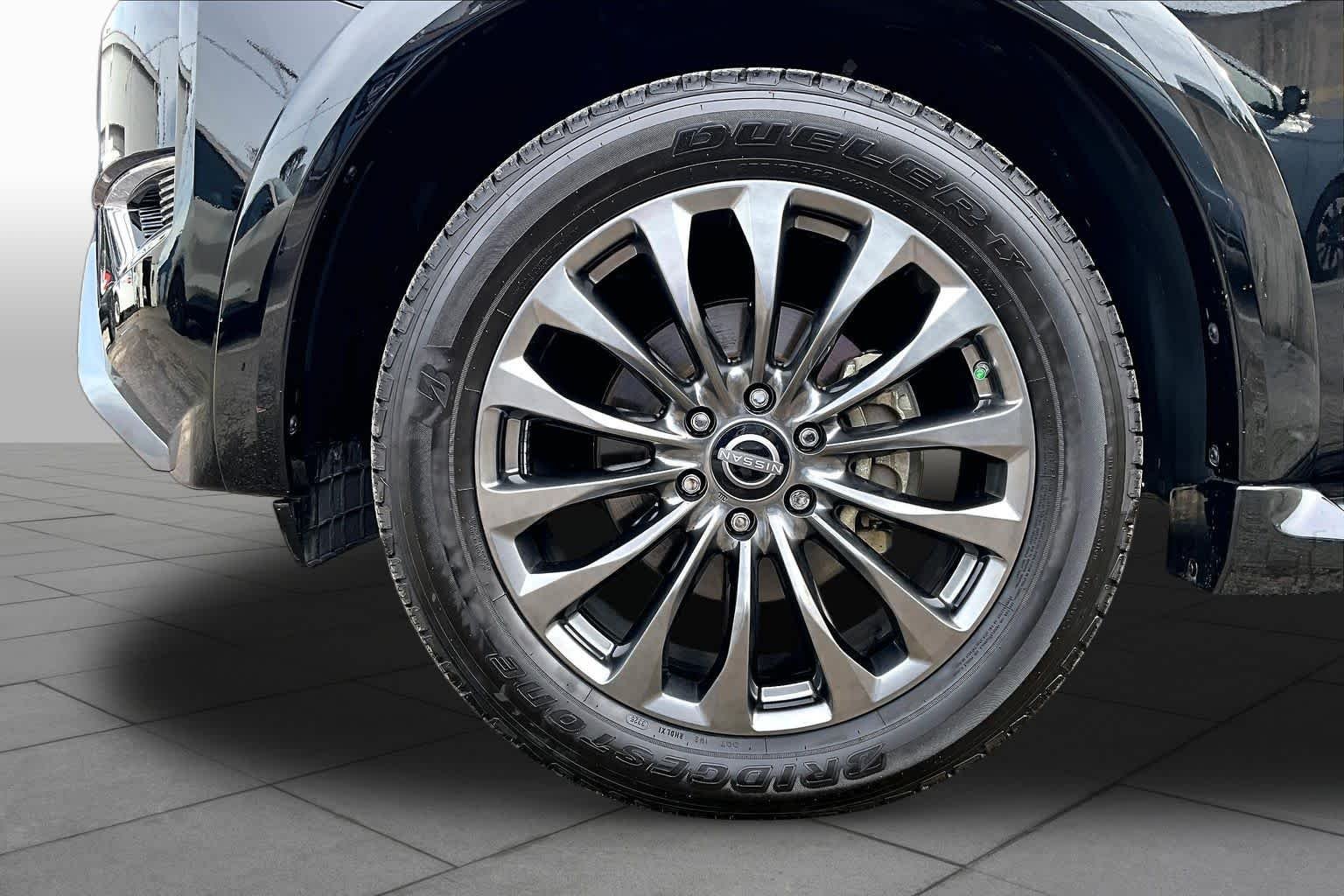 Used 2023 Super Black Nissan Platinum image 13