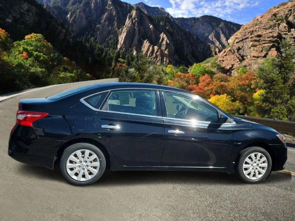 Used 2019 Super Black Nissan S image 2
