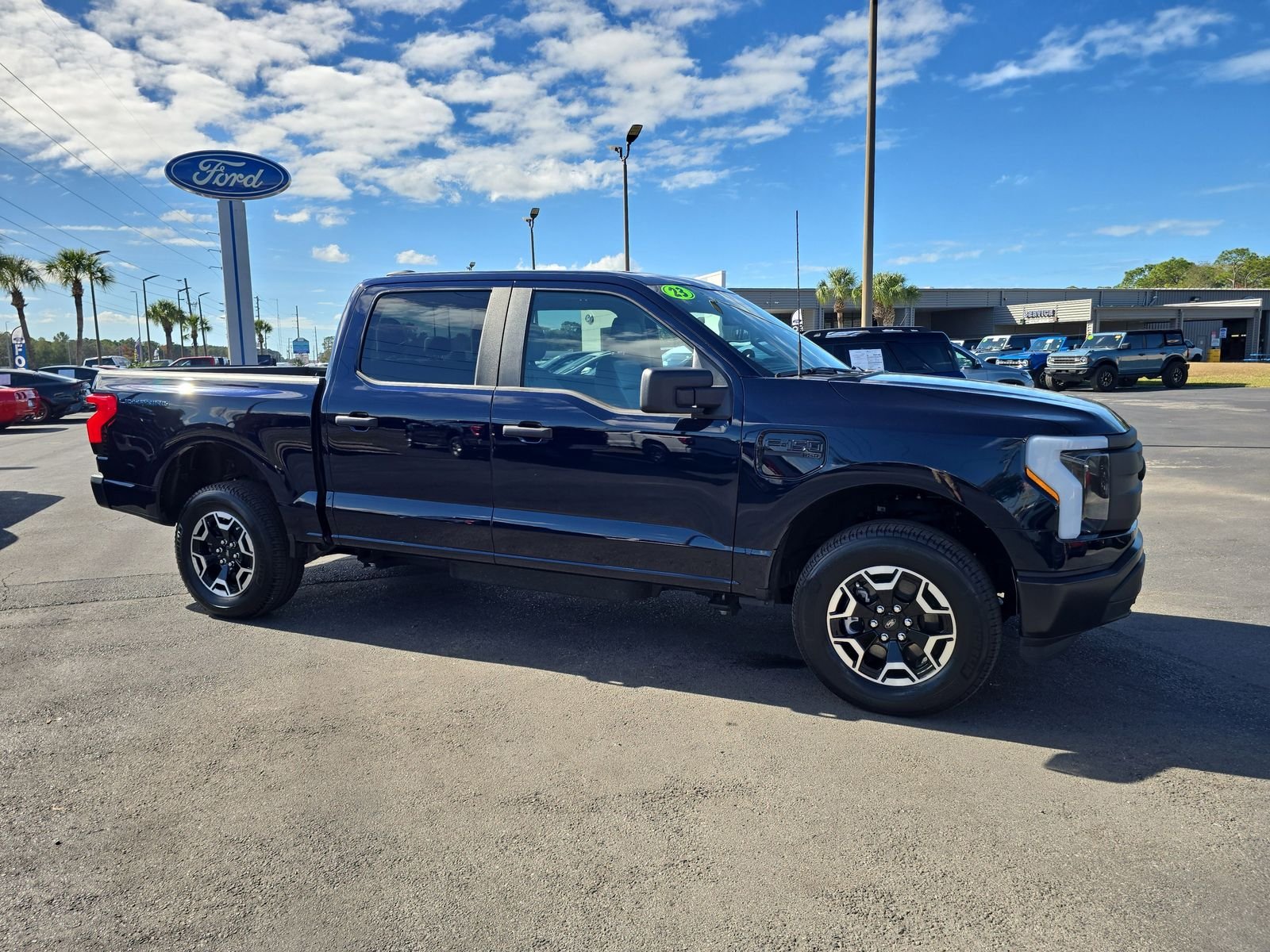 Certified 2023 Ford F-150 Lightning Pro with VIN 1FTVW1EL8PWG07378 for sale in Spring Hill, FL