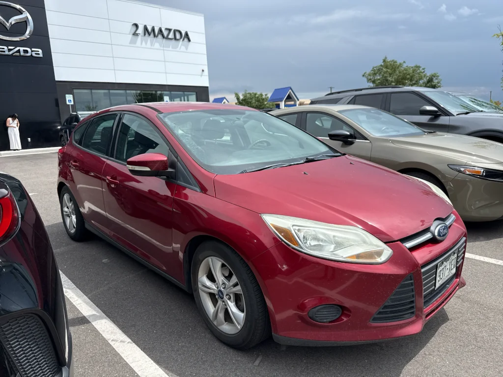 Used 2014 Ruby Red Tinted Clearcoat Ford SE image 2