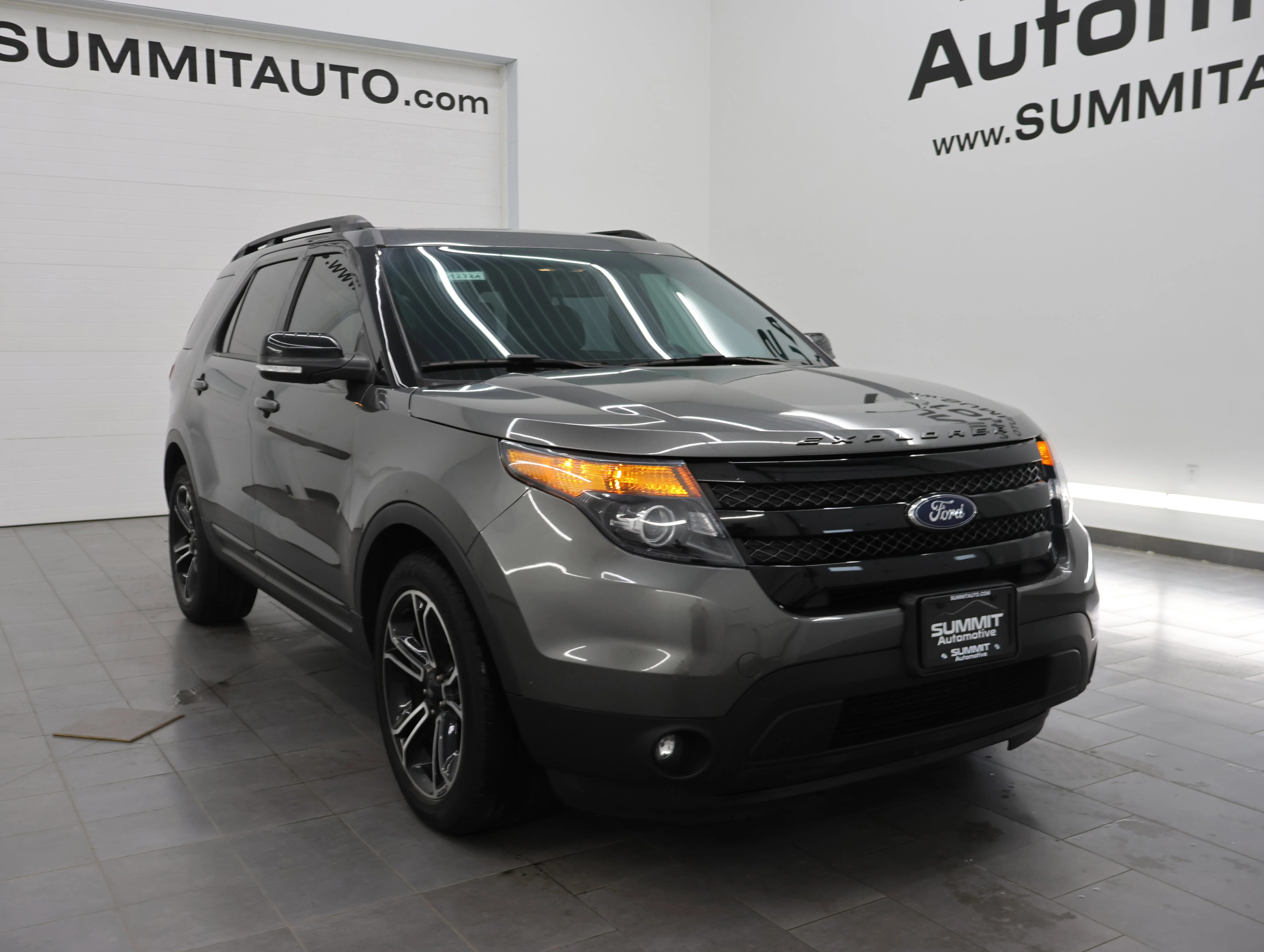 Used 2015 Magnetic Metallic Ford Sport image 2