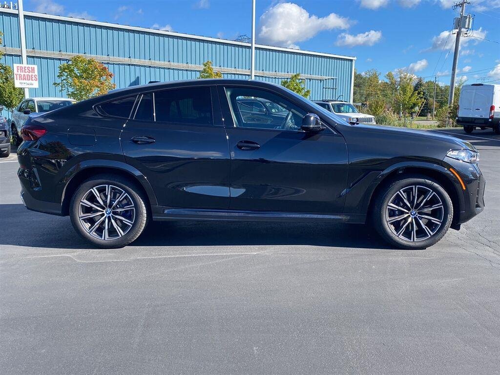 Used 2026 Black Sapphire Metallic BMW M60i image 12