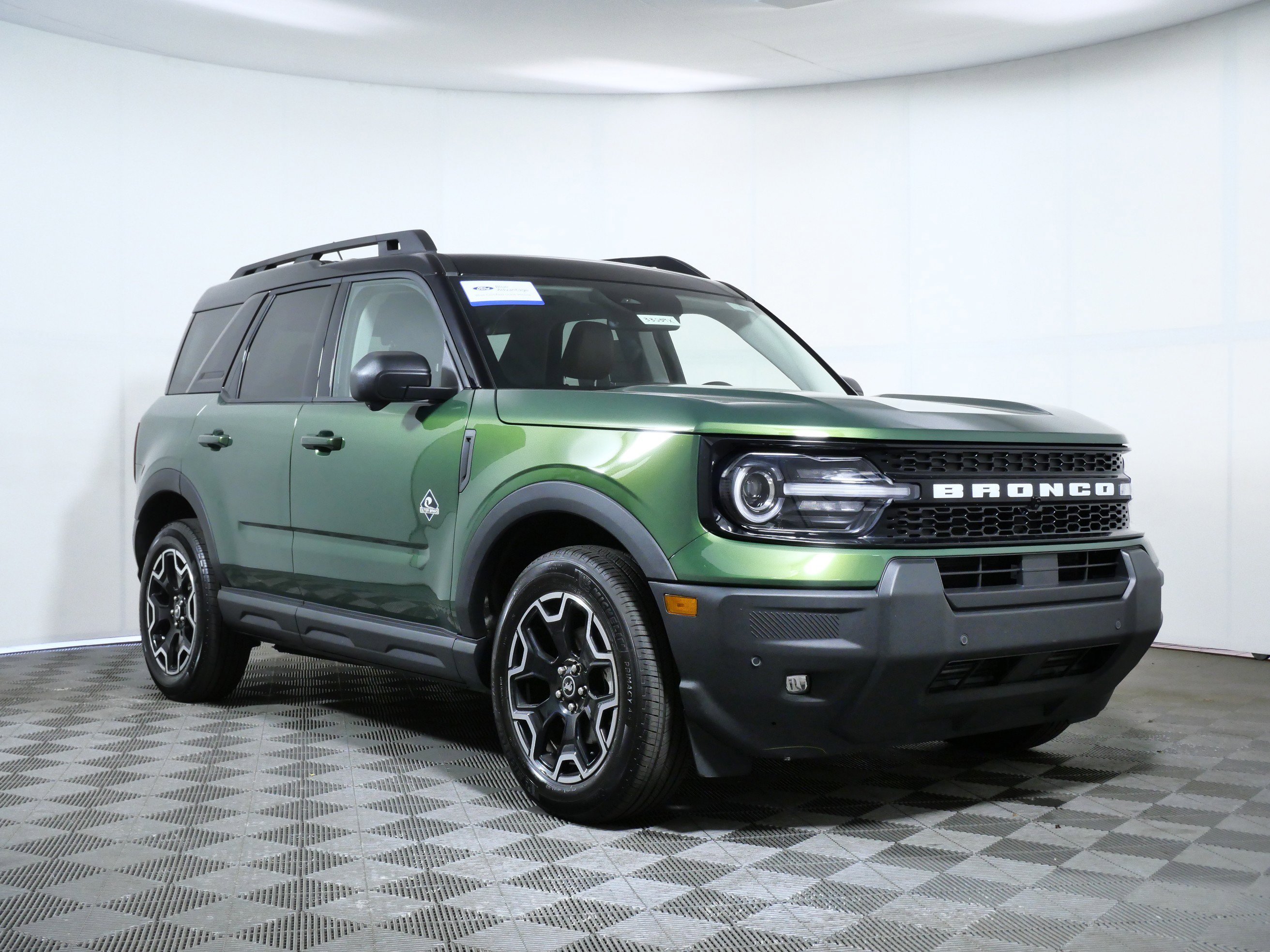 Certified Used 2025 Eruption Green Metallic Ford Outer Banks image 1