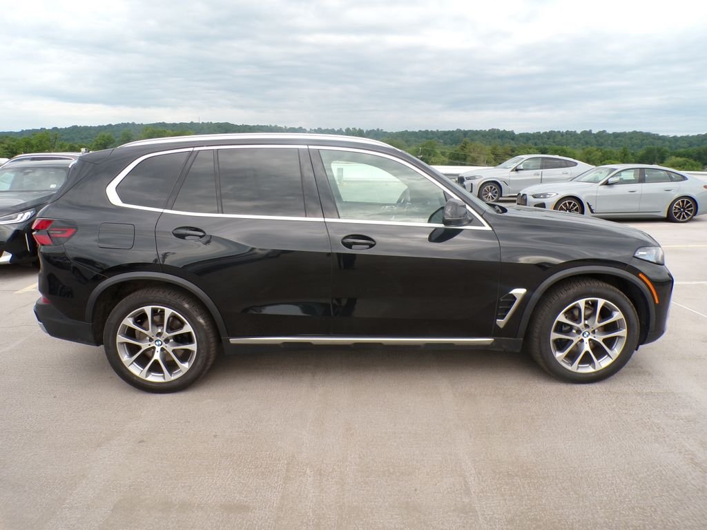 Certified Used 2024 Black Sapphire Metallic BMW xDrive40i image 7