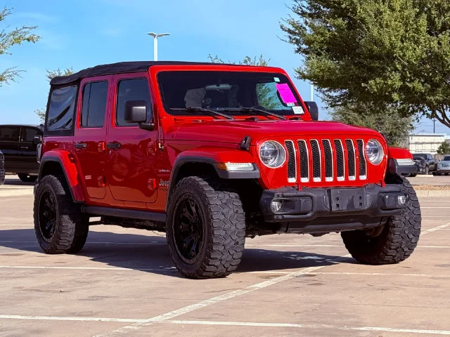 Used 2018 Red Jeep Unlimited Sahara image 7