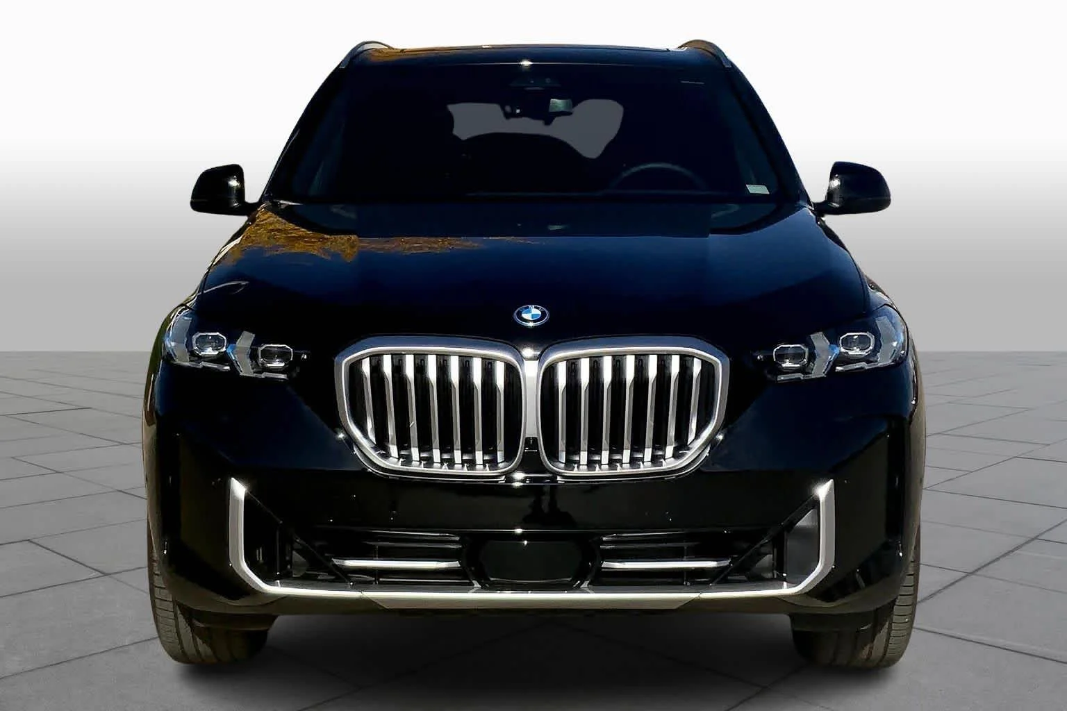 New 2026 Black Sapphire Metallic BMW xDrive50e image 3