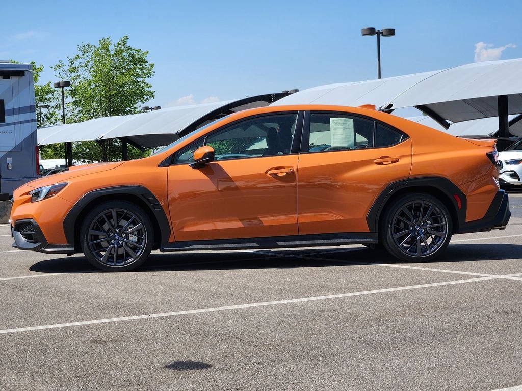 Used 2023 Solar Orange Pearl Subaru Premium image 5