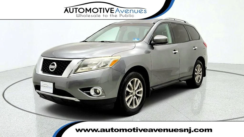 Used 2016 Gun Metallic Nissan 4WD 4dr SV image 1