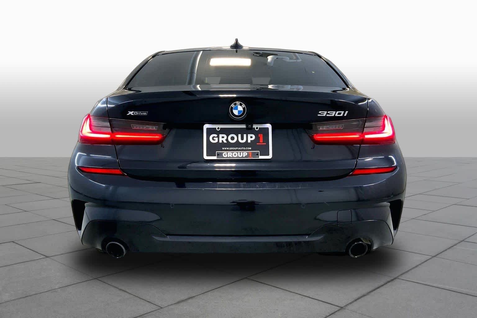 Used 2021 Black Sapphire Metallic BMW 330i xDrive image 4