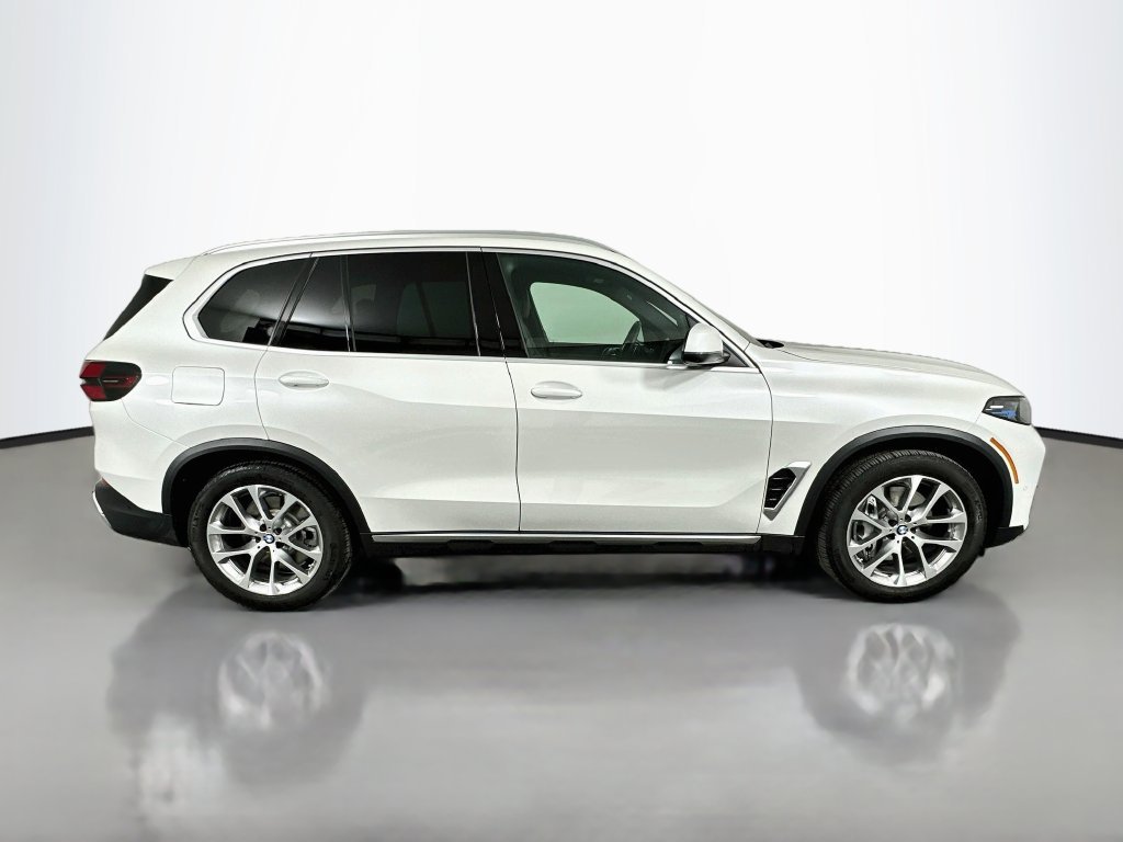 Used 2026 White Metallic BMW xDrive50e image 4