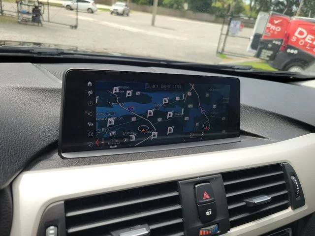 Used 2018 Black BMW 320i xDrive image 28