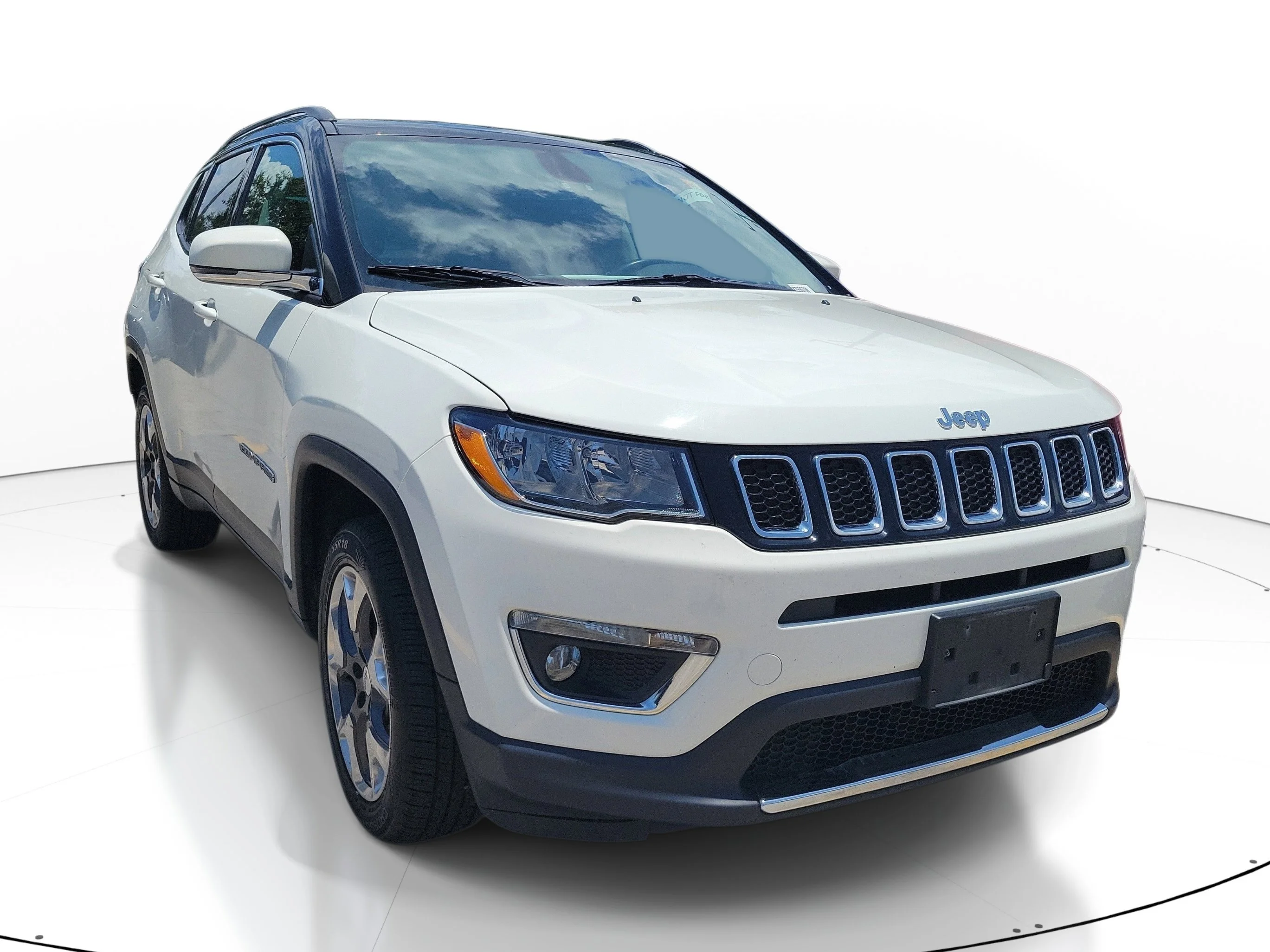 Used 2019 White Clearcoat Jeep Limited image 1