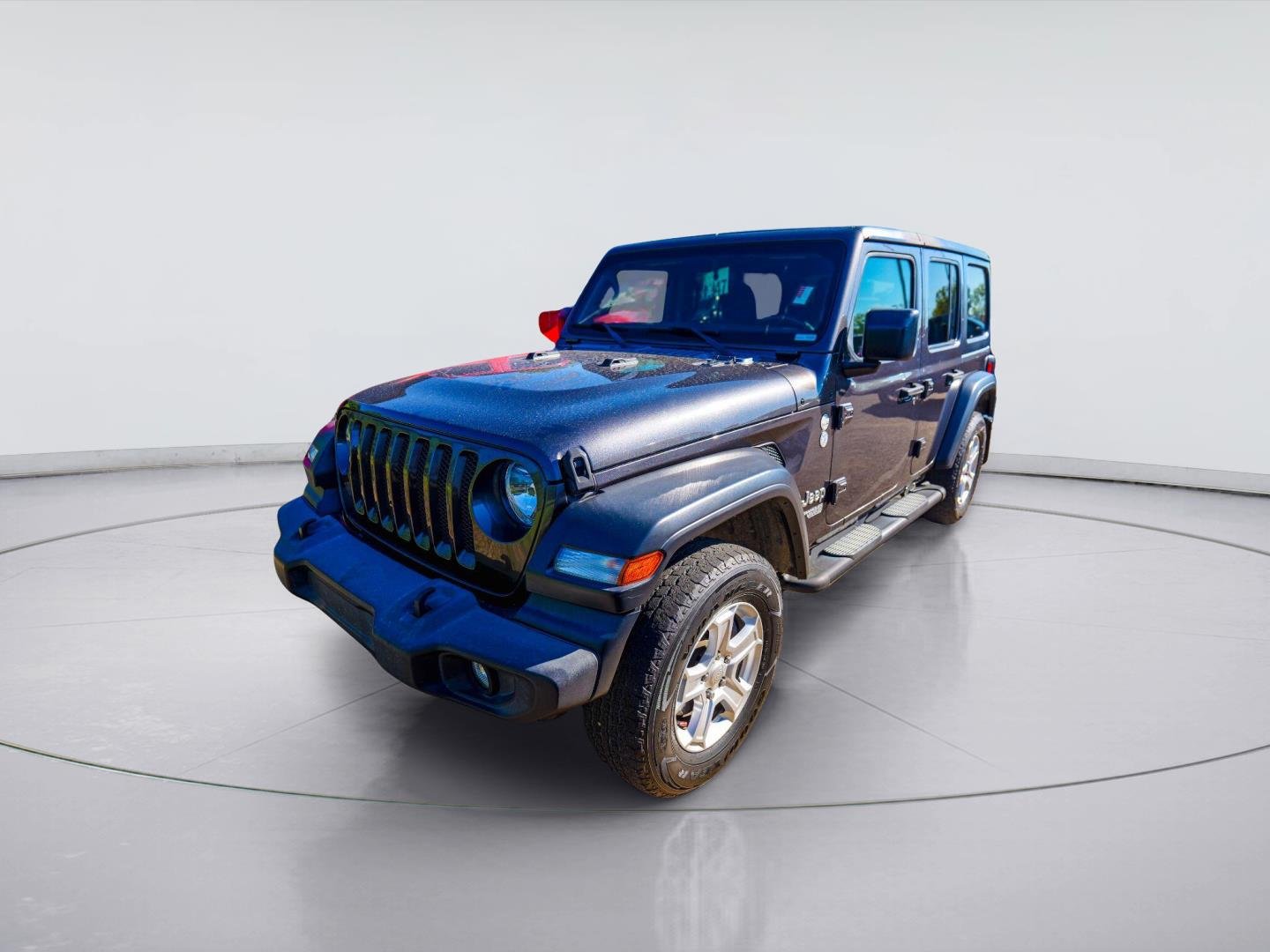 Used 2020 Granite Crystal Metallic Clearcoat Jeep Sport S image 1