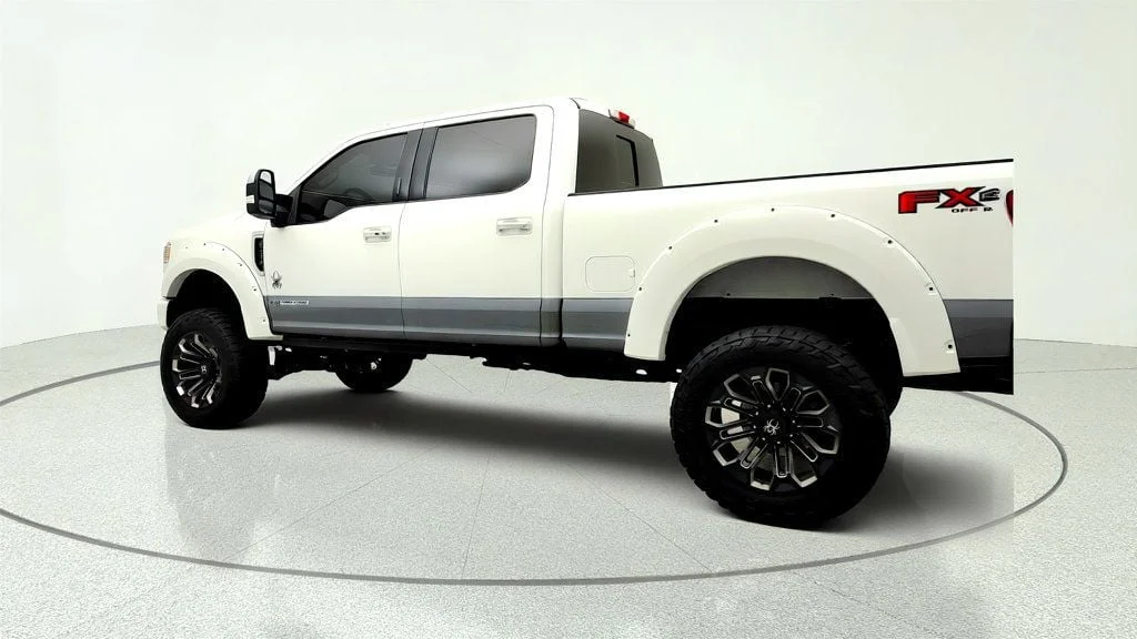 Used 2022 Star White Metallic Tri-Coat Ford Black Widow LARIAT 4WD Crew Cab 6.75