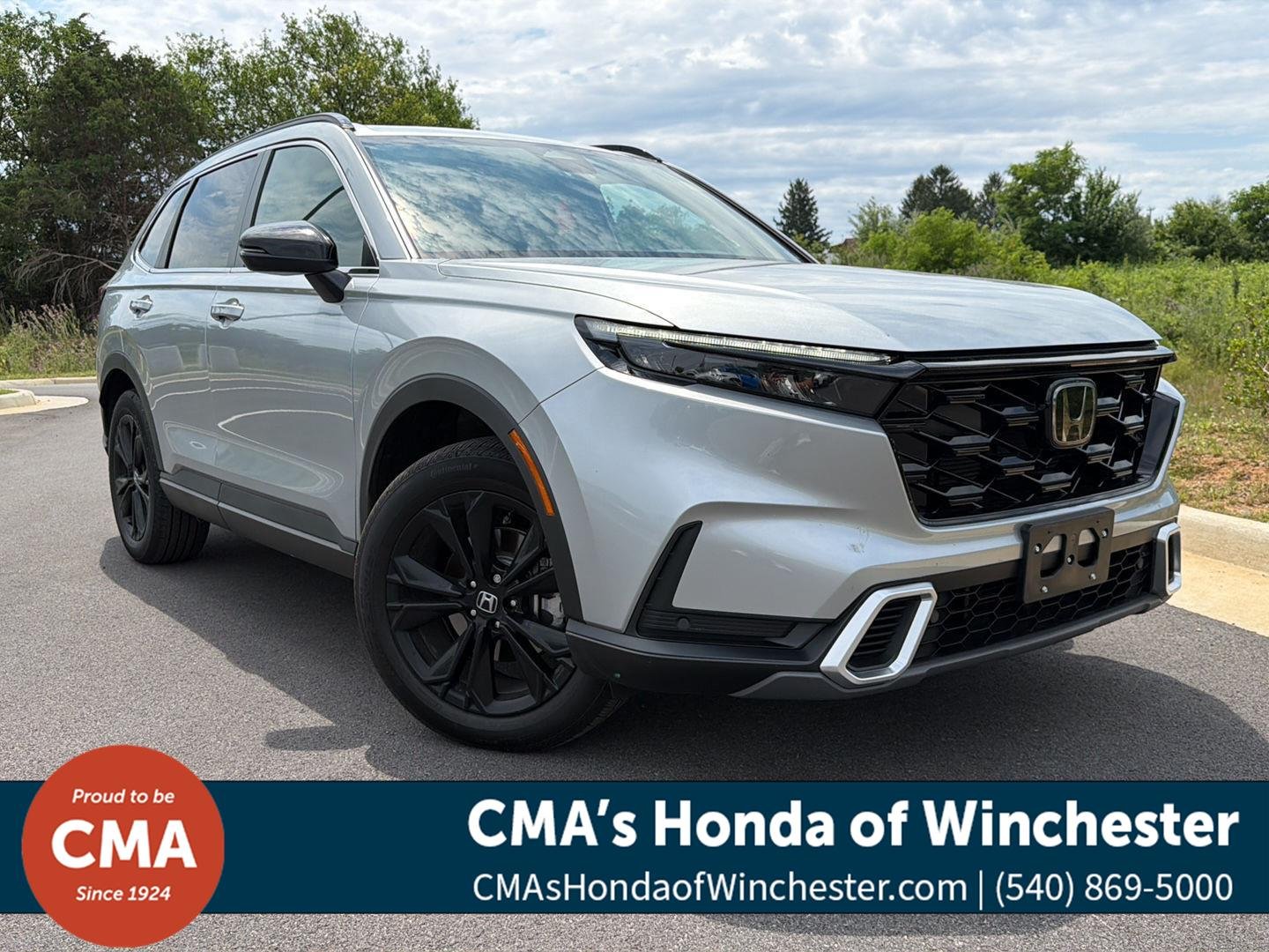Used 2025 Solar Silver Metallic Honda Sport Touring image 1