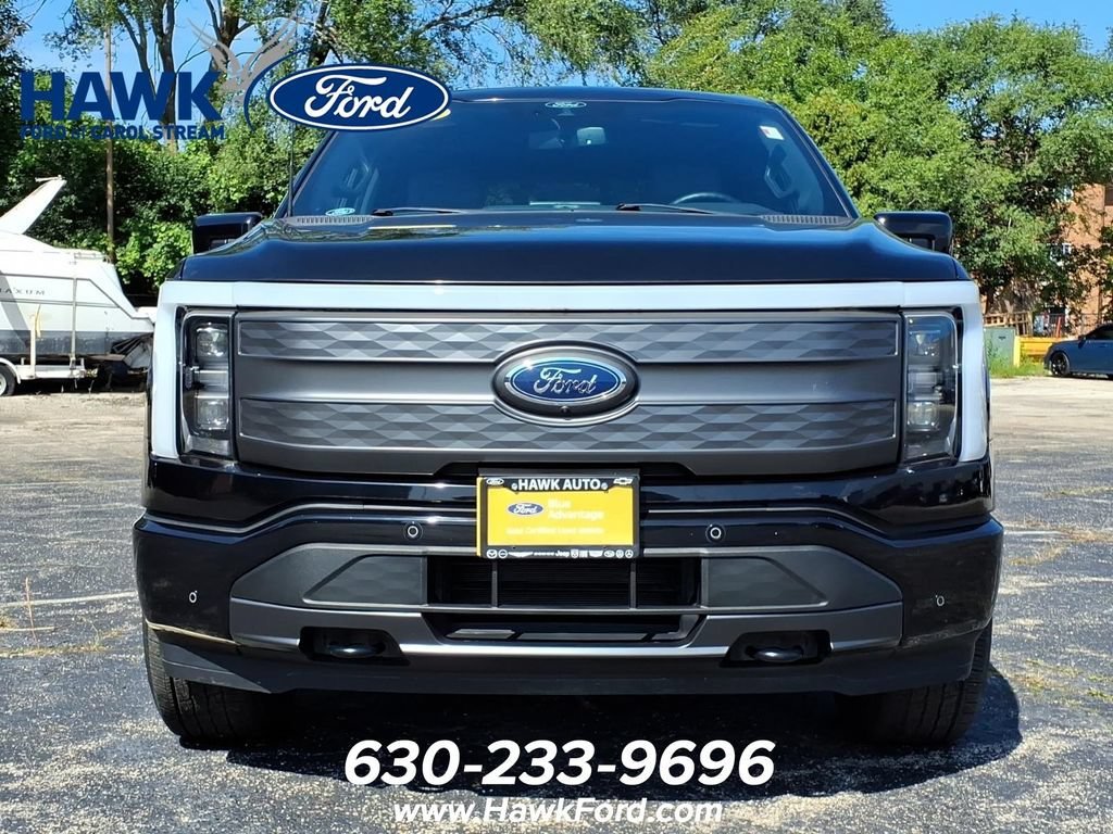 Used 2022 Ford F-150 Lightning Lariat with VIN 1FT6W1EV8NWG00093 for sale in St. Charles, IL